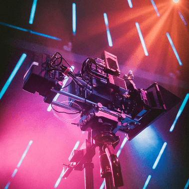 A high-tech film camera in a studio.